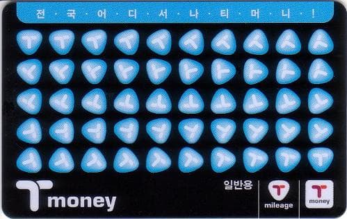 A Korean transit card held in front of a card reader
